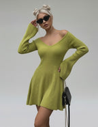 Aura Mini Dress by Lauven - Slim fit green knit with V-neck and flared cuffs, perfect for modern elegance.