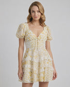 Soleil Mini Dress by Lauven, soft floral print, tiered ruffles, flattering A-line silhouette for a romantic and elegant look.