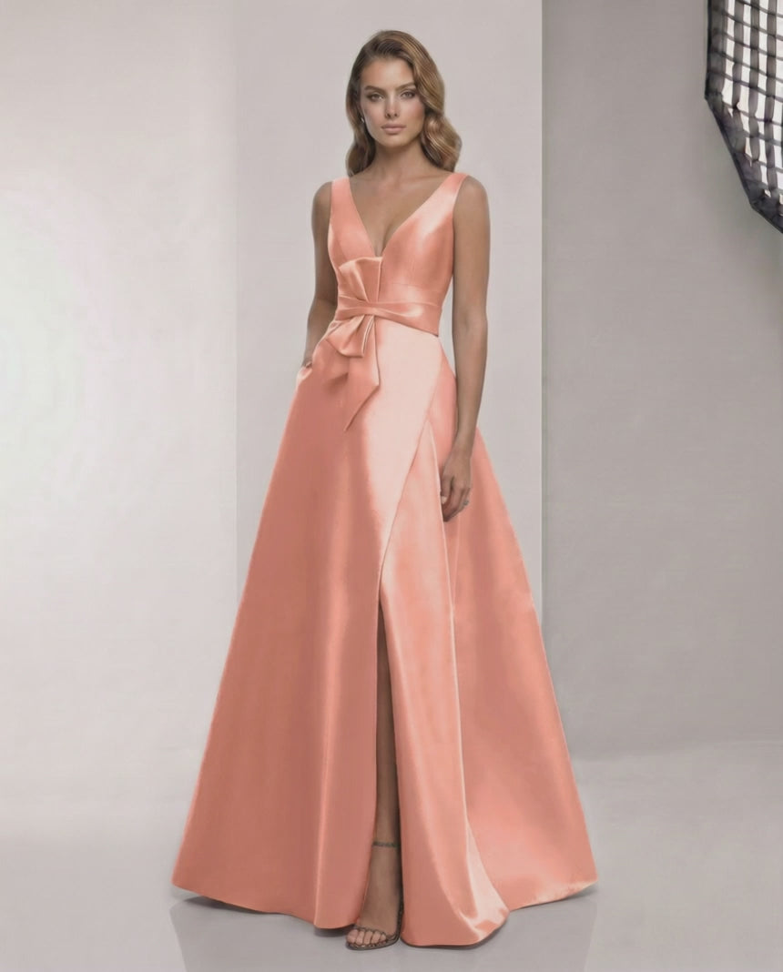 Elegant Solara Maxi Dress by Lauven, satin A-line peach dress with V-neck and bow detail, perfect for formal occasions.