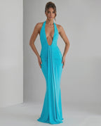 Aurelia Maxi Dress in turquoise, featuring a halter neck and stylish ruching for a sleek, modern look by Lauven.