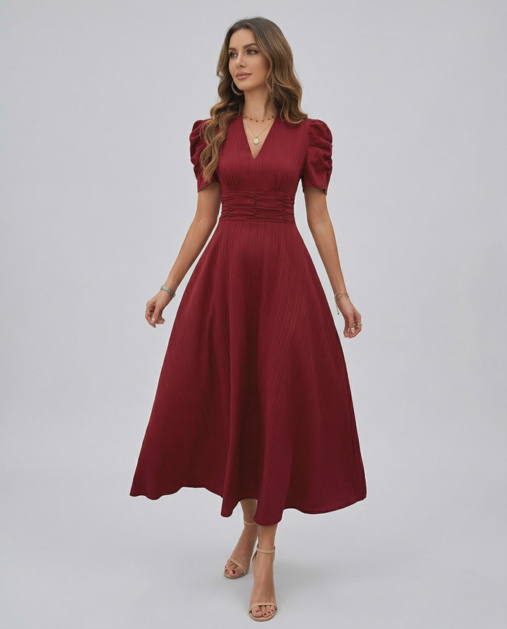 Vesper Midi Dress showcasing a deep V-neckline, puff sleeves, and ruched waist for elegant wedding guest attire by Lauven.