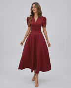 Vesper Midi Dress showcasing a deep V-neckline, puff sleeves, and ruched waist for elegant wedding guest attire by Lauven.