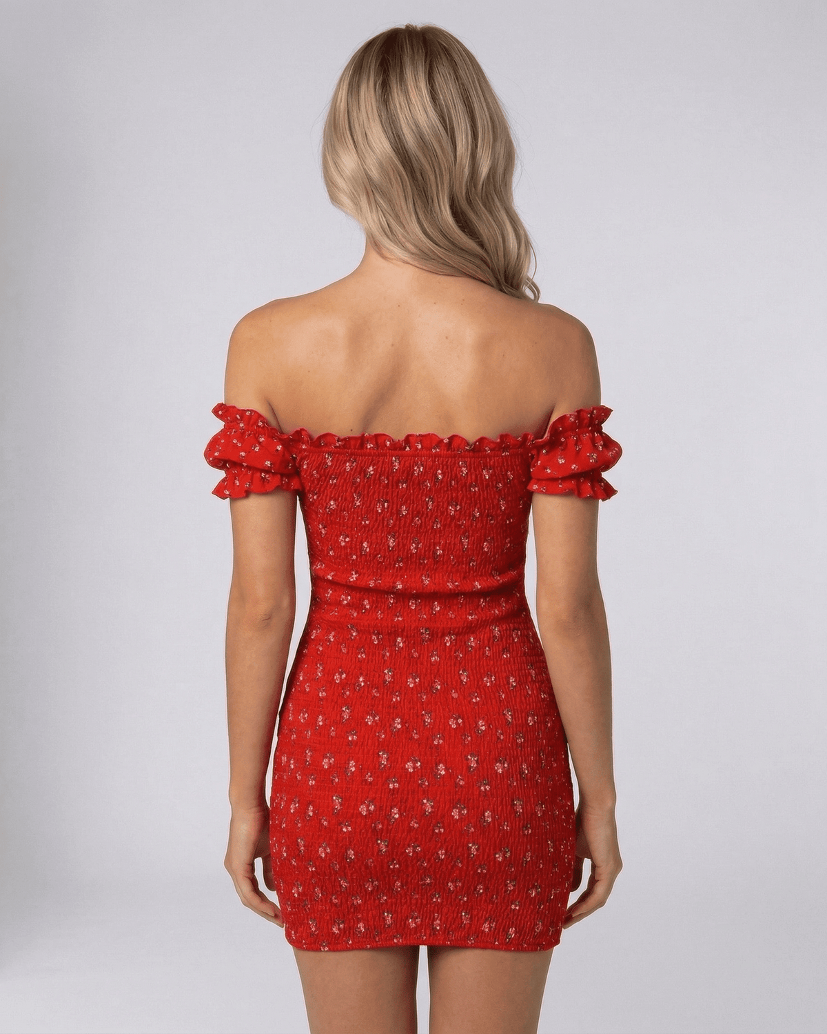 Back view of the Rosalia Mini Dress by Lauven, featuring red floral design and off shoulder neckline.