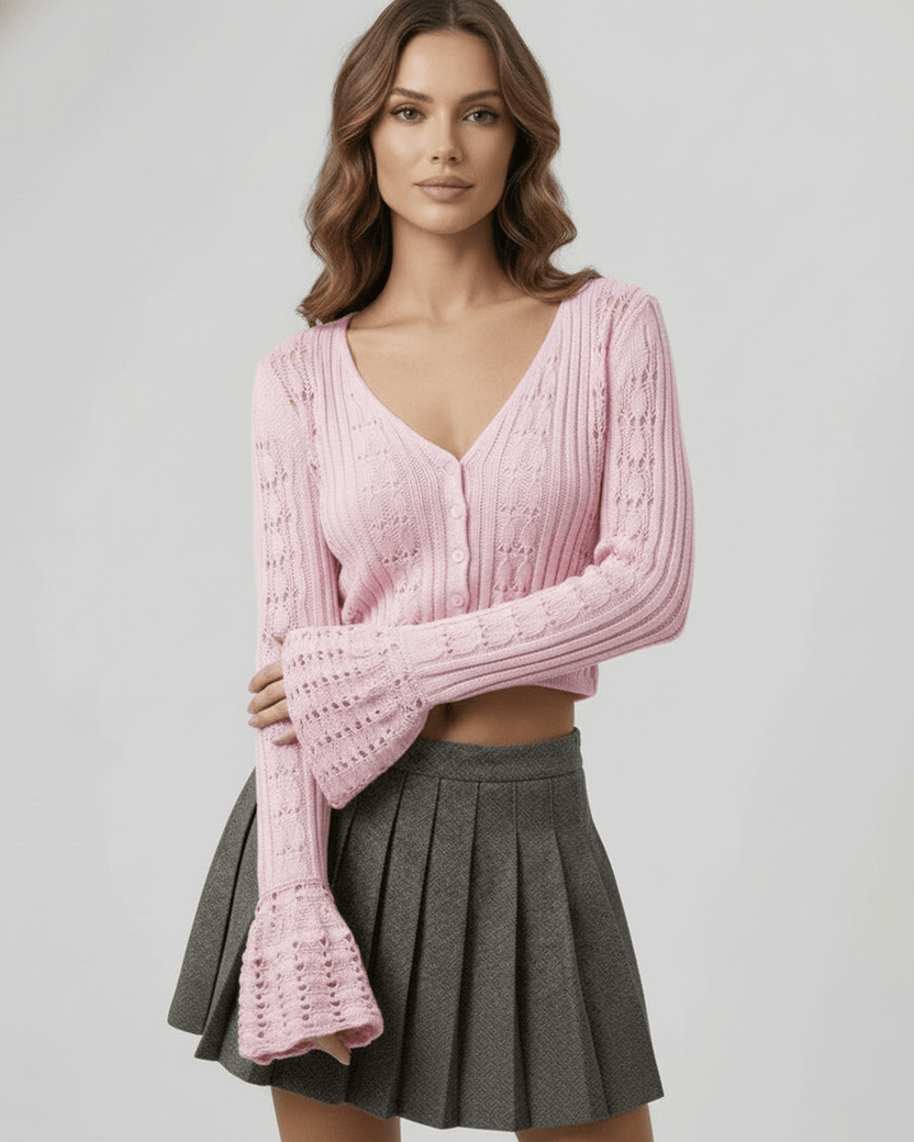 Roselle Cardigan featuring a soft pink cropped silhouette and refined openwork knit detailing by Lauven.