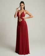 Roselle Maxi Dress in red with deep V-neck and cut-out detail, showcasing a flowing silhouette by Lauven.