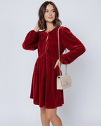 Ruby Mini Dress by Lauven, elegant red velvet princess dress with lantern sleeves and drawstring detailing.