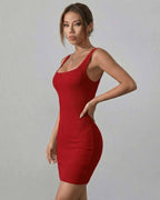 Ruby Mini Dress by Lauven in classic red ribbed knit, featuring a sleek bodycon silhouette and square neckline.