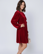 Ruby Mini Dress by Lauven, featuring elegant red velvet fabric and a relaxed waist silhouette.