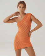 Saffron Mini Dress by Lauven featuring a vibrant orange hue and stylish ribbed texture.