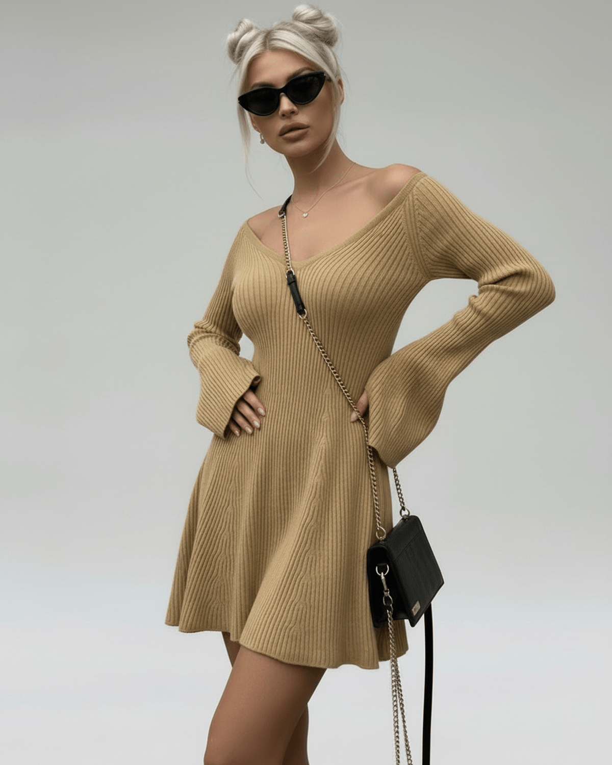 Saffron Mini Dress by Lauven in soft camel knit with V-neck and flared sleeves, showcasing contemporary elegance.
