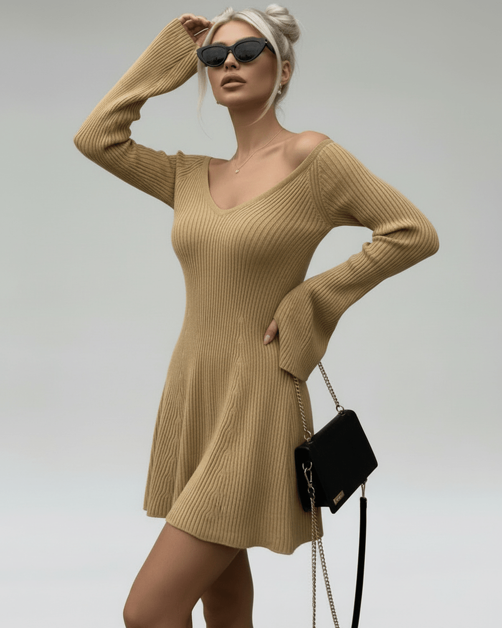 Saffron Mini Dress by Lauven in camel knit with V-neck and flared sleeves, featuring a soft A-line silhouette.