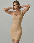 Saffron Mini Dress by Lauven featuring a warm beige ribbed knit, showcasing a body-skimming silhouette and square neckline.