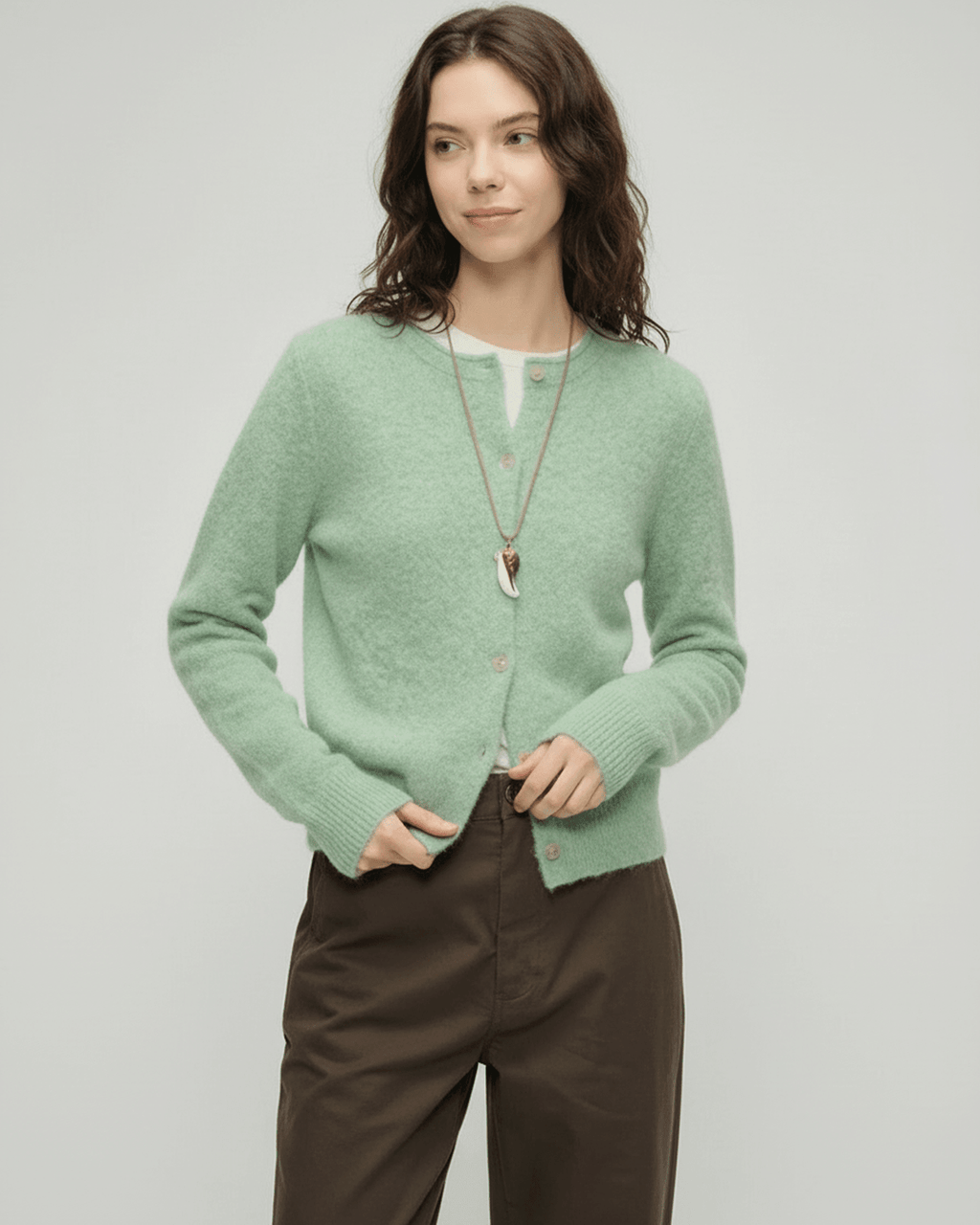 Sage Cardigan by Lauven – Women's green cardigan sweater with round neck and button front, perfect for layering.