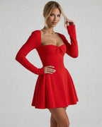 Scarlet Mini Dress featuring bold red color, long sleeves, square neckline with ruched bow, by Lauven.