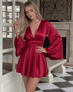 Scarlet Mini Dress by Lauven featuring a vibrant red A-line design with flare sleeves and V-neckline.