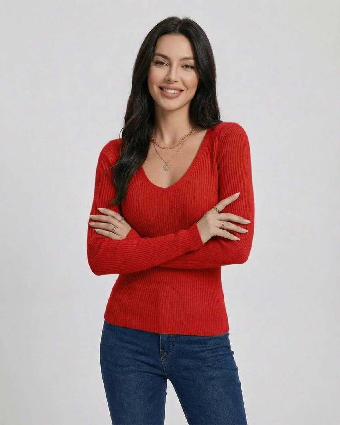 Women wearing the Scarlet Pullover by Lauven, a red V-neck sweater with a slim fit and long sleeves.