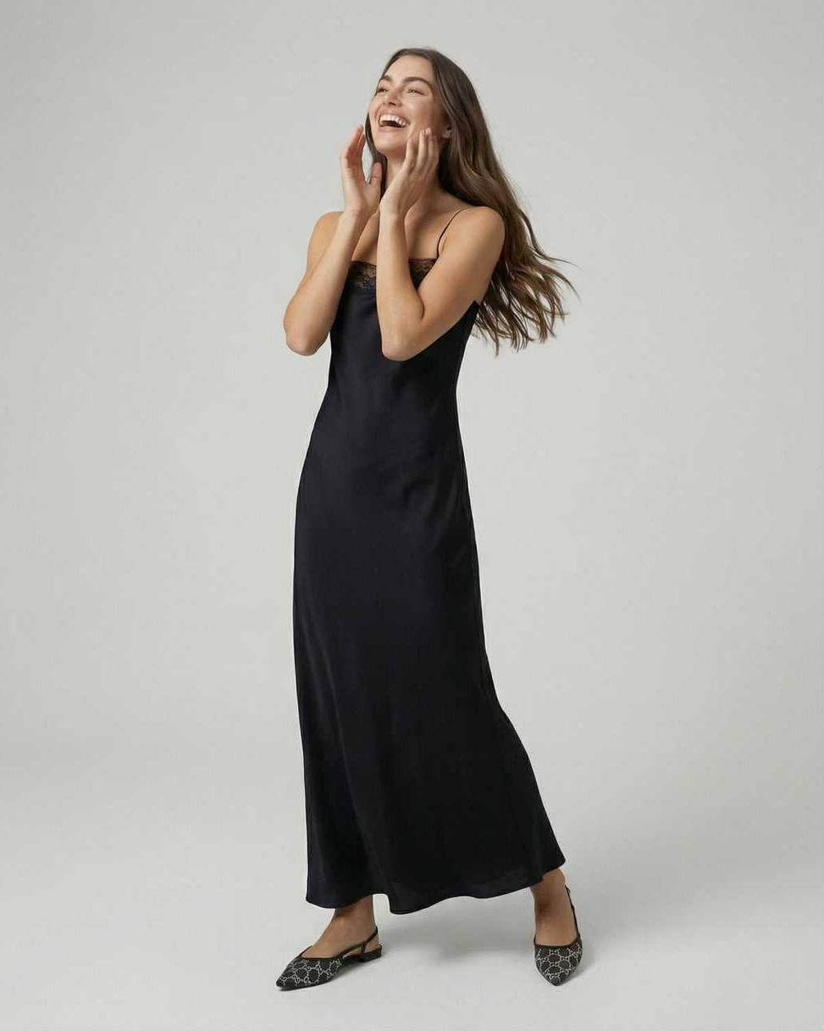 Selene Maxi Dress by Lauven worn by a model, showcasing its sleek lace-trimmed design and elegant silhouette.
