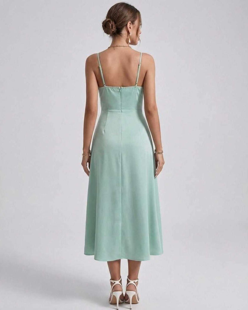 Selene Midi Dress showcasing a satin draped bodice and refined spaghetti straps, ideal for elegant wedding guest looks by Lauven.