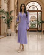 Selene Midi Dress in lavender, featuring a V-neck, long lantern sleeves, and elegant flared skirt by Lauven.