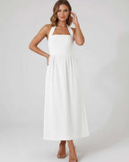 Selene Midi Dress - White halter midi dress with elegant A-line flow by Lauven, offering a flattering silhouette and airy feel.