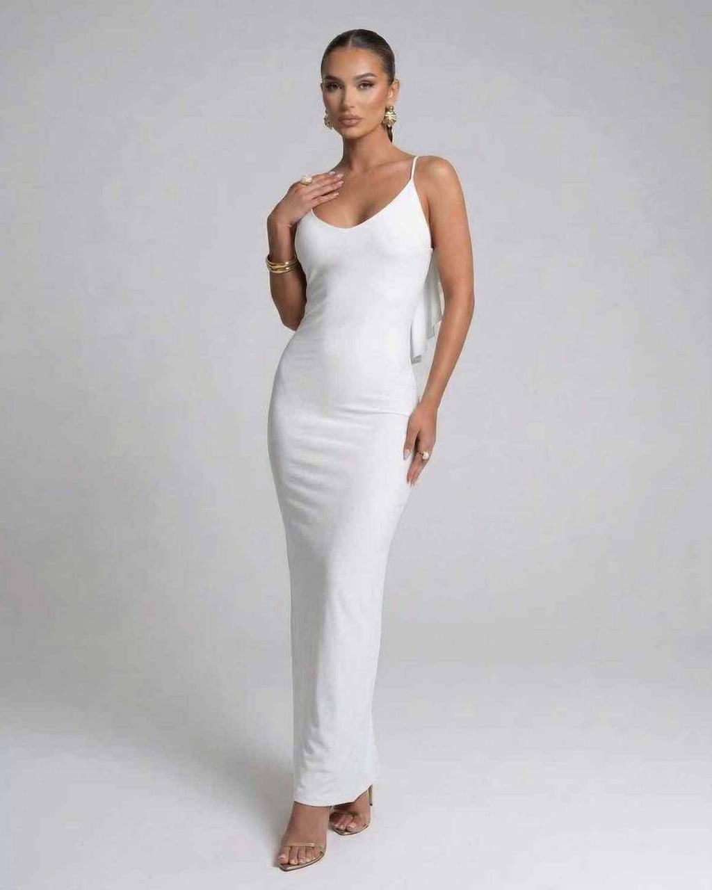 Seraphina Maxi Dress by Lauven in sleek white, featuring spaghetti straps and a fitted pencil silhouette.