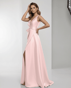 Seraphine Maxi Dress in pink satin with wrap slit, bow waist, and flowing A-line silhouette from Lauven, perfect for formal occasions.
