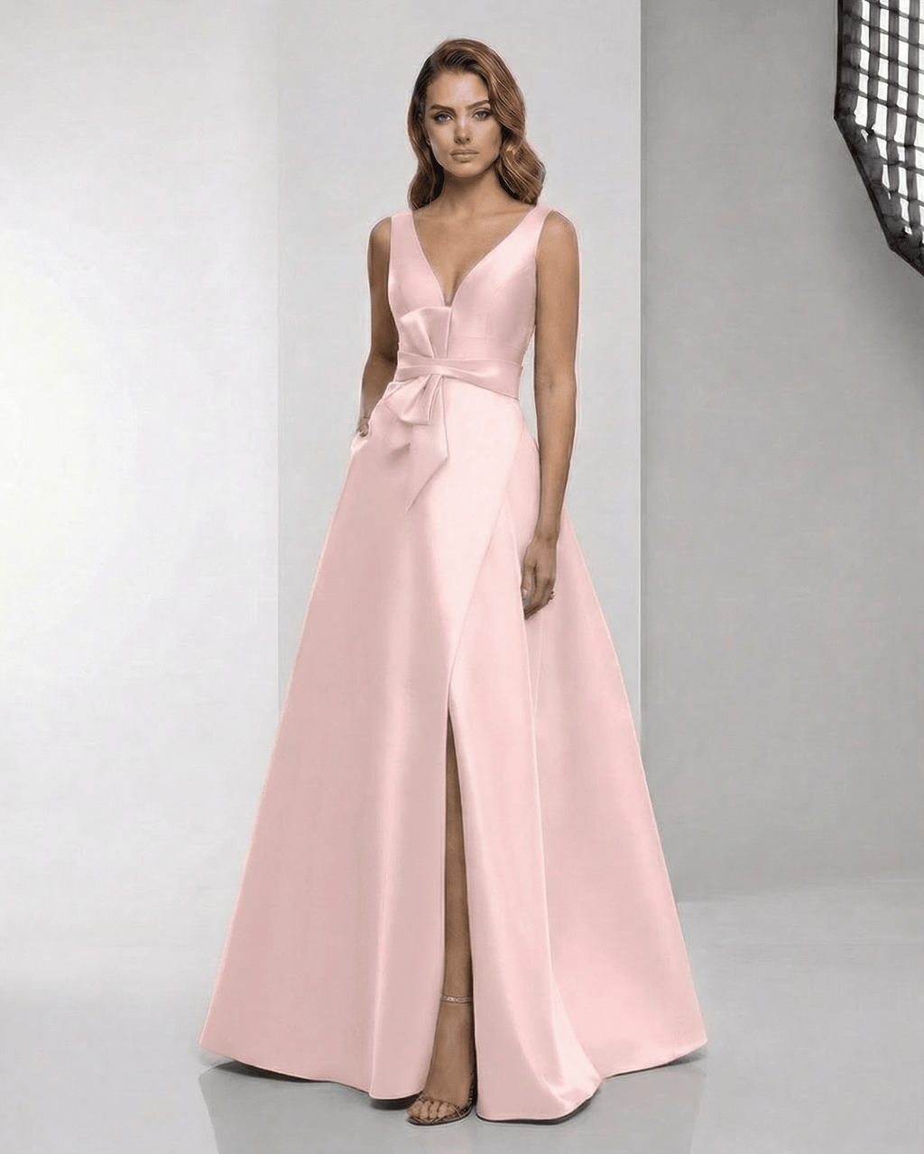 Seraphine Maxi Dress: Elegant pink satin A-line with wrap slit, bow waist, perfect for formal occasions.
