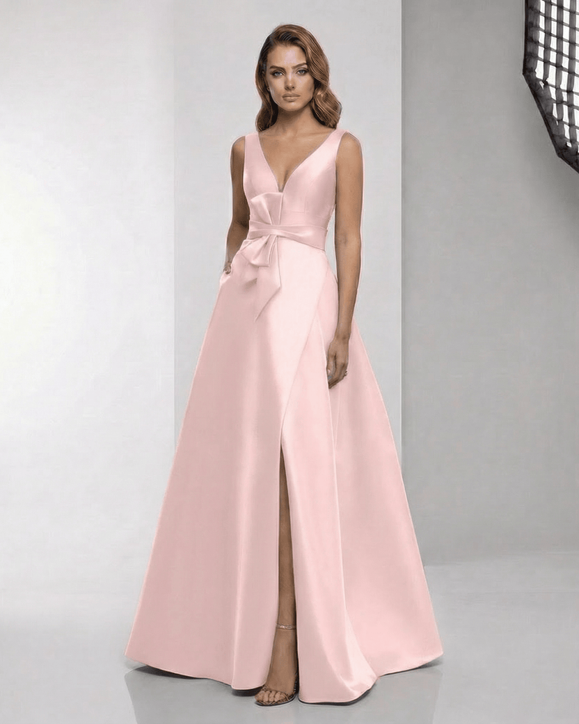 Seraphine Maxi Dress: Elegant pink satin A-line with wrap slit, bow waist, perfect for formal occasions.