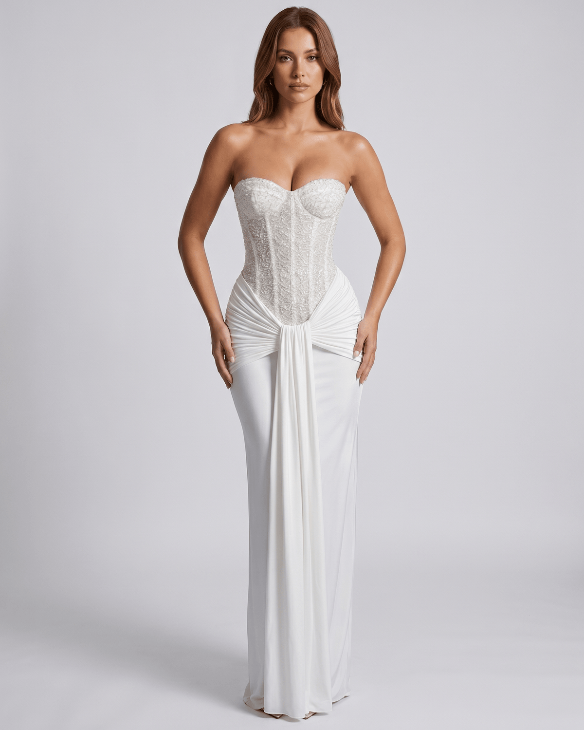 Serelisse Maxi Dress featuring off-the-shoulder design, structured corset bodice, and fluid skirt by Lauven