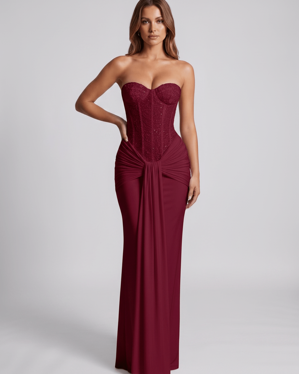 Serelisse Maxi Dress in burgundy, featuring an off-the-shoulder corset-style bodice, soft stretch, and lace texture by Lauven.