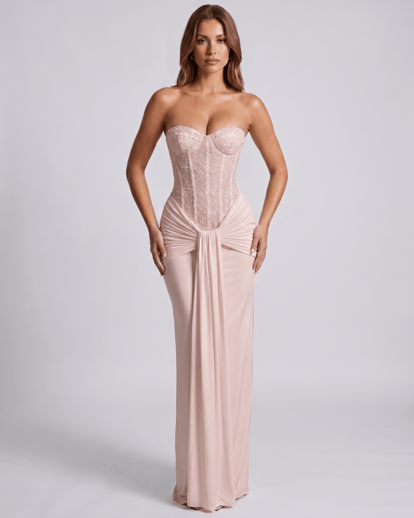 Serelisse Maxi Dress featuring off-the-shoulder design, structured corset bodice, and soft stretch material by Lauven.