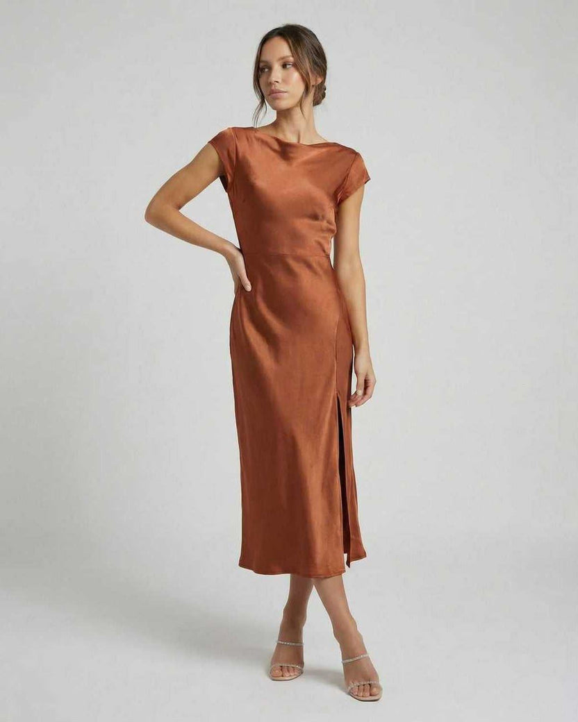 Seren Midi Dress - Elegant satin gown with twisted-back, cutout detail, rich rust color from Lauven. Effortlessly sophisticated.