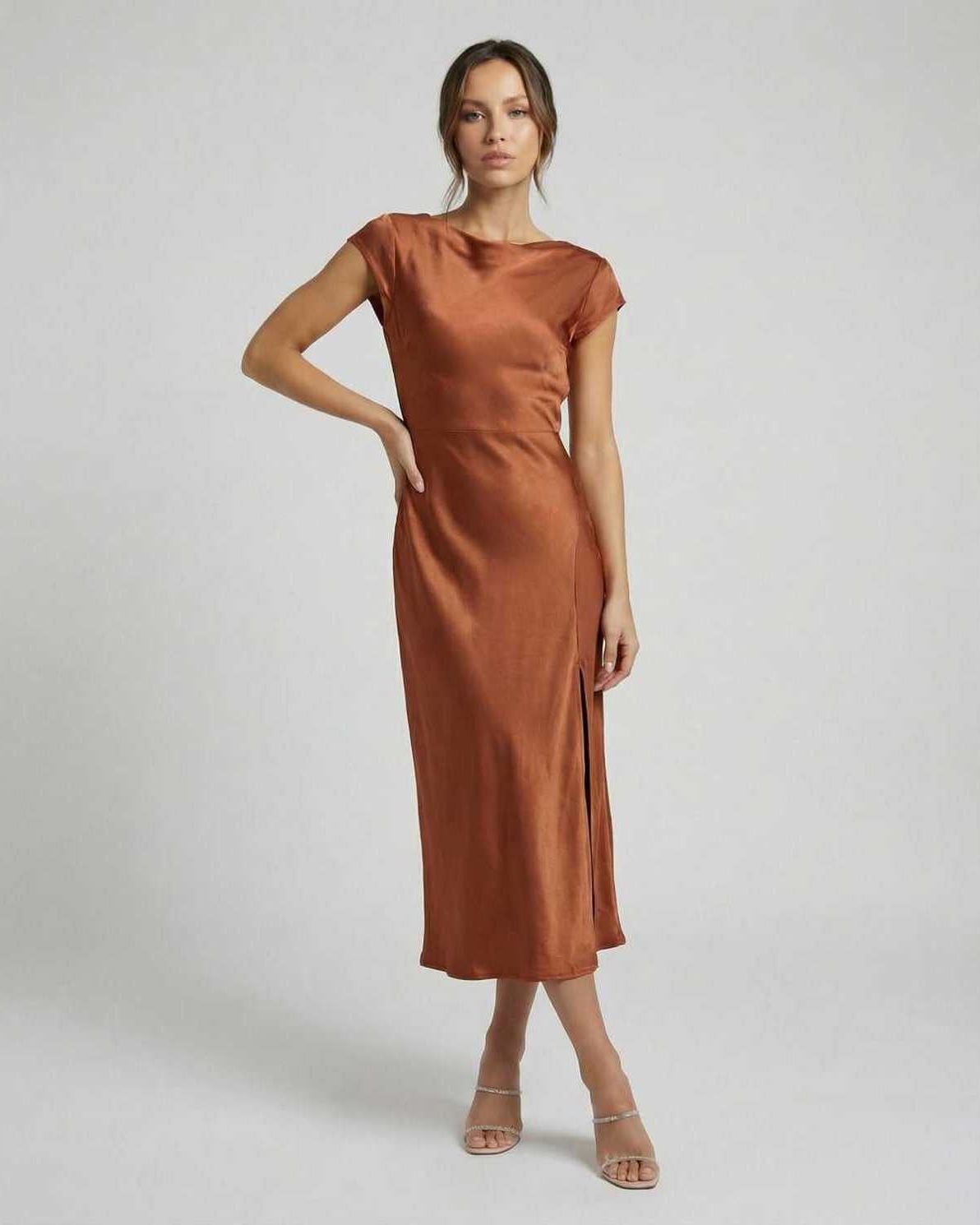 Seren Midi Dress - Elegant satin dress with twisted-back, cutout detail, and rich rust color by Lauven.