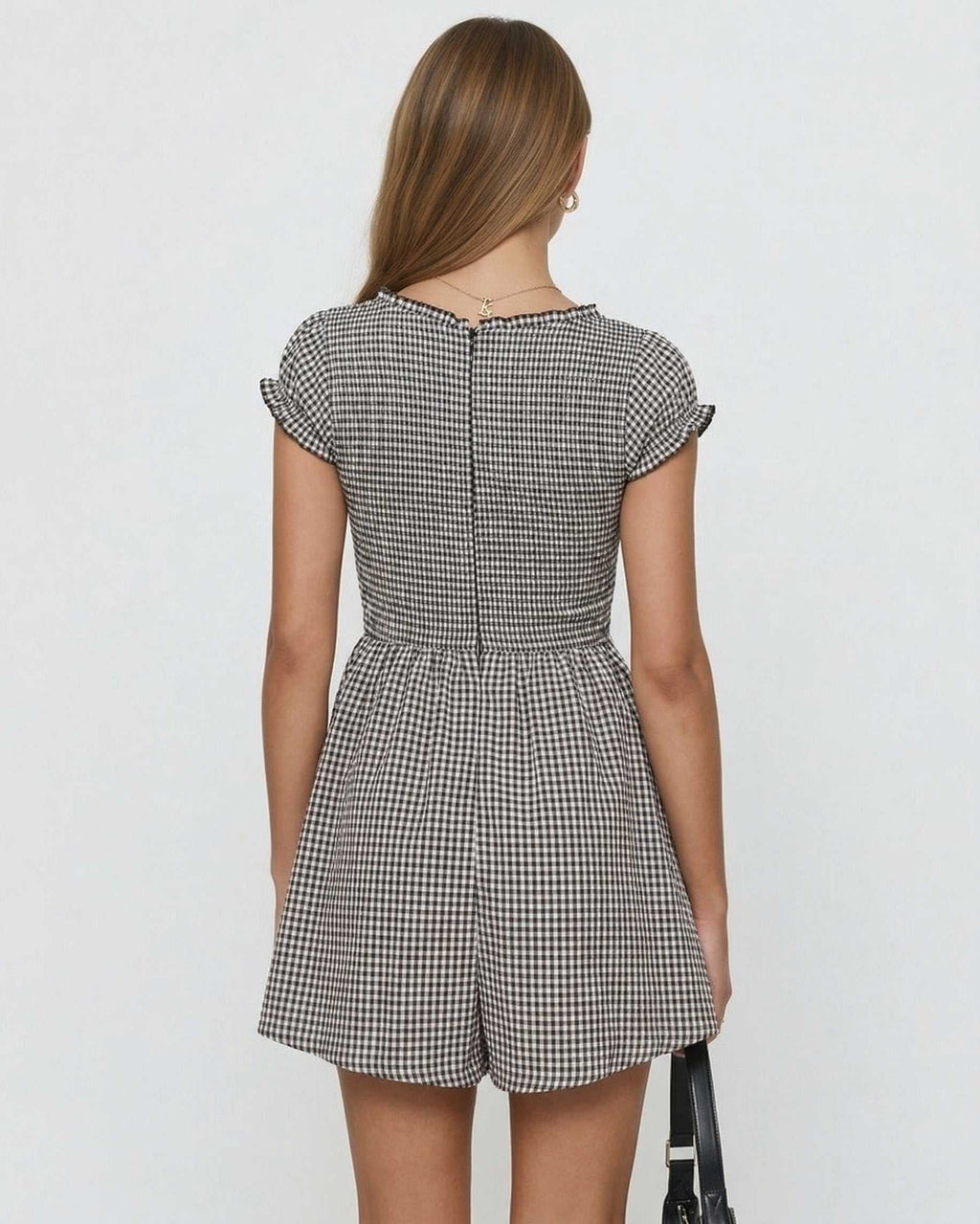 Back view of the Seren Mini Dress by Lauven featuring a gingham check pattern and cap sleeves.