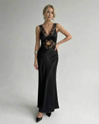 Lauven Serena Maxi Dress featuring a sleek black design with lace detailing, V-neck and elegant silhouette.