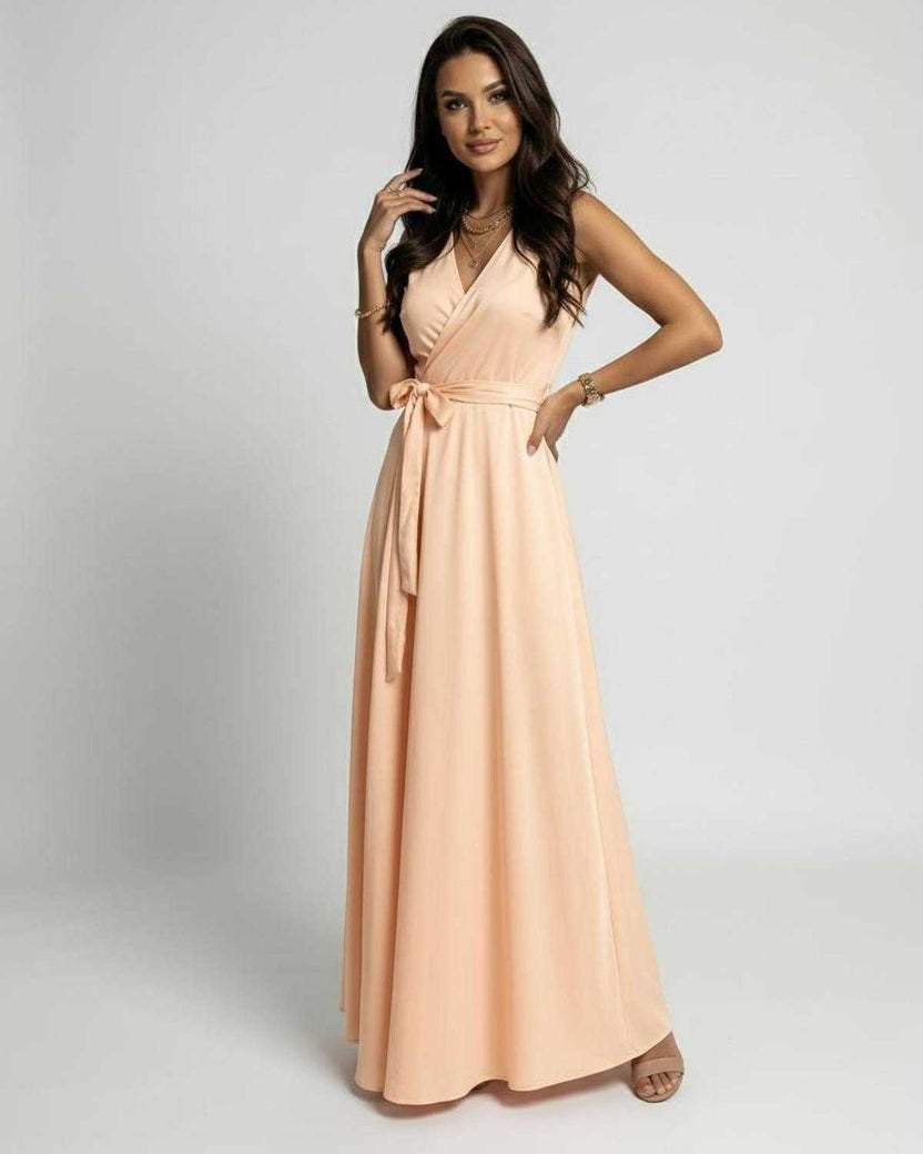 Serena Maxi Dress by Lauven in soft peach with a V-neck and wrap-style bodice, perfect for elegant occasions.