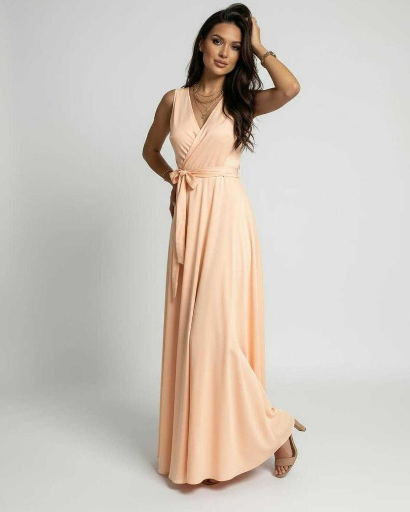 Serena Maxi Dress by Lauven in soft peach, featuring a V-neck and flowing design for elegant style.