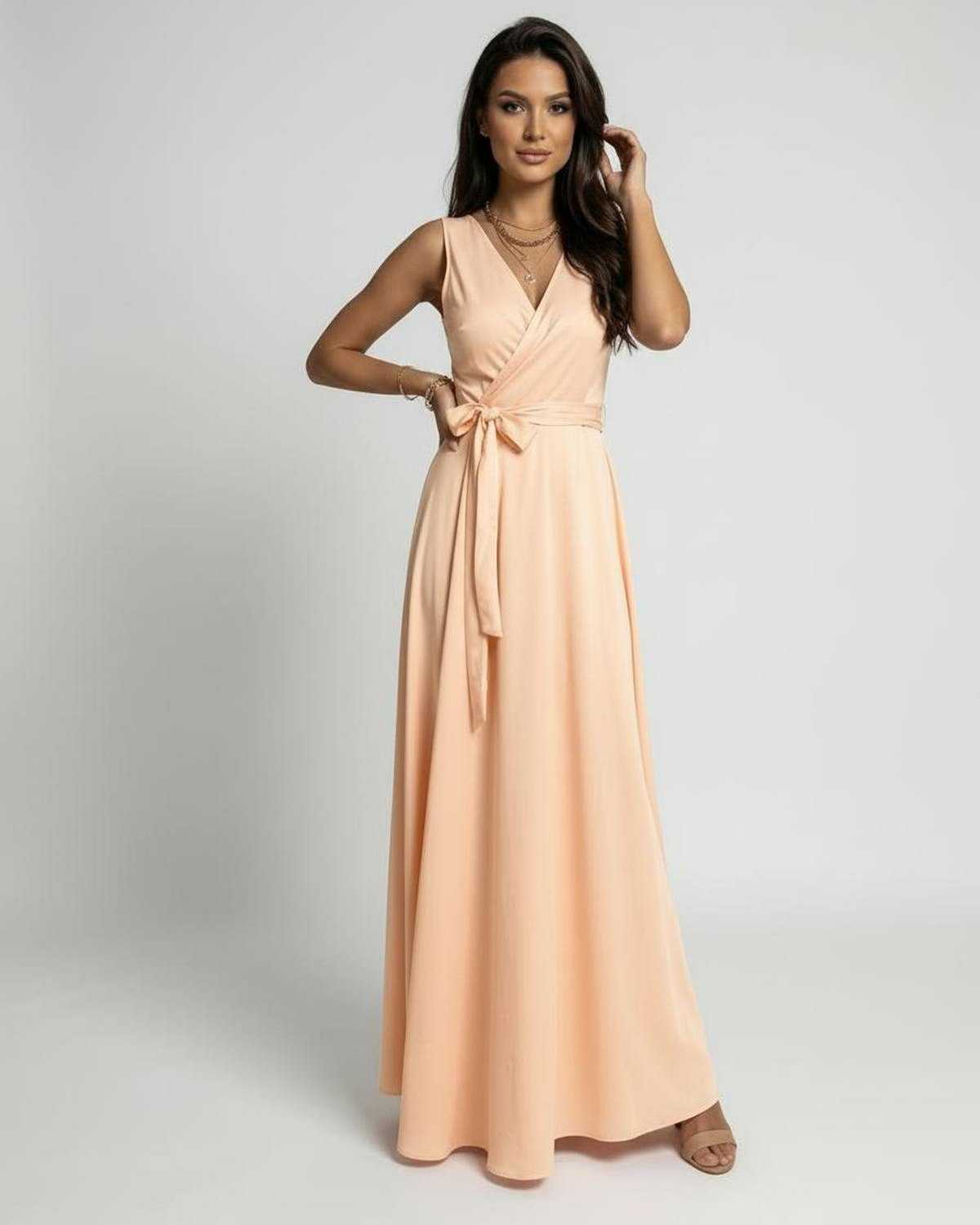 Serena Maxi Dress by Lauven in soft peach with elegant V-neck and wrap-style design.