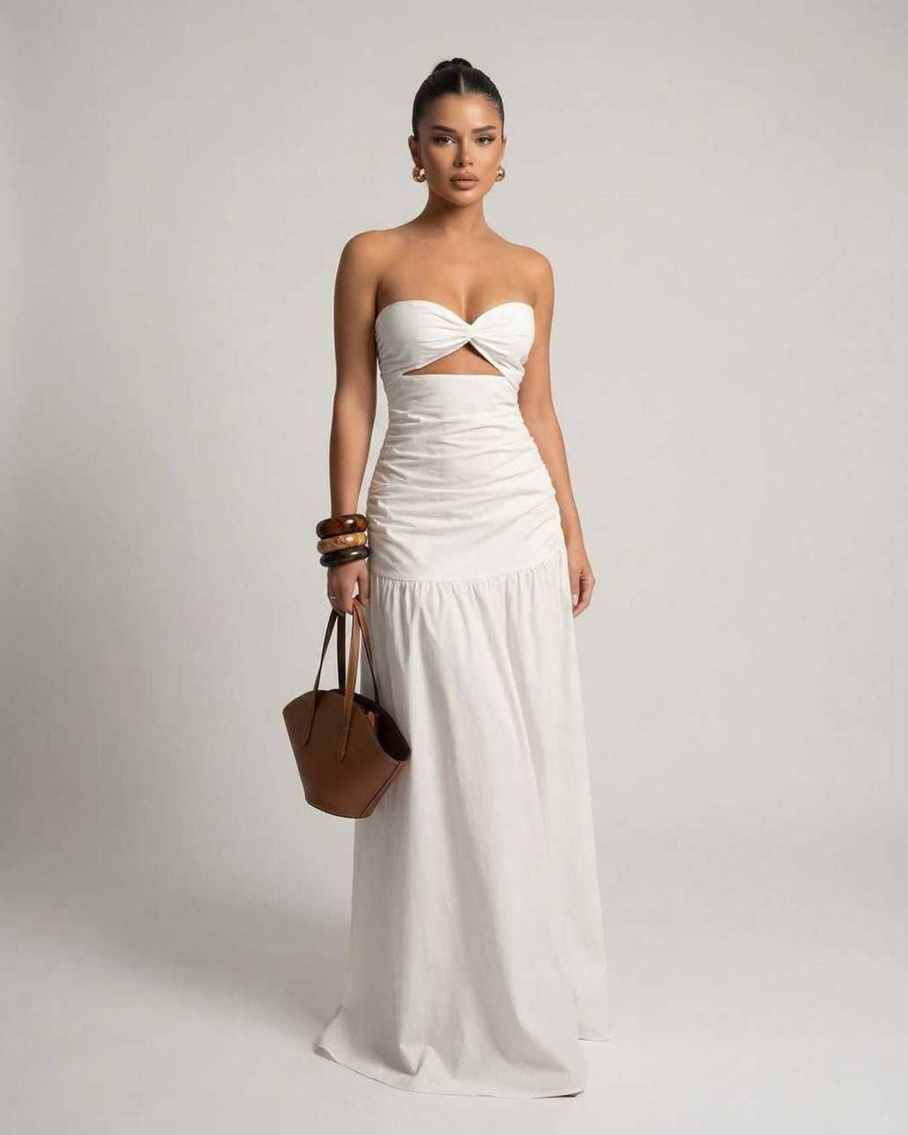 Serena Maxi Dress - White strapless dress with cutout high waist silhouette, elegant and flexible fit from Lauven.