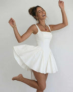 Serena Mini Dress by Lauven, elegant white square collar camisole dress with spaghetti straps and A-line profile.