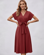 Serene Midi Dress by Lauven, pleated fabric, V-neck, self-tie belt, perfect for day-to-evening styling.