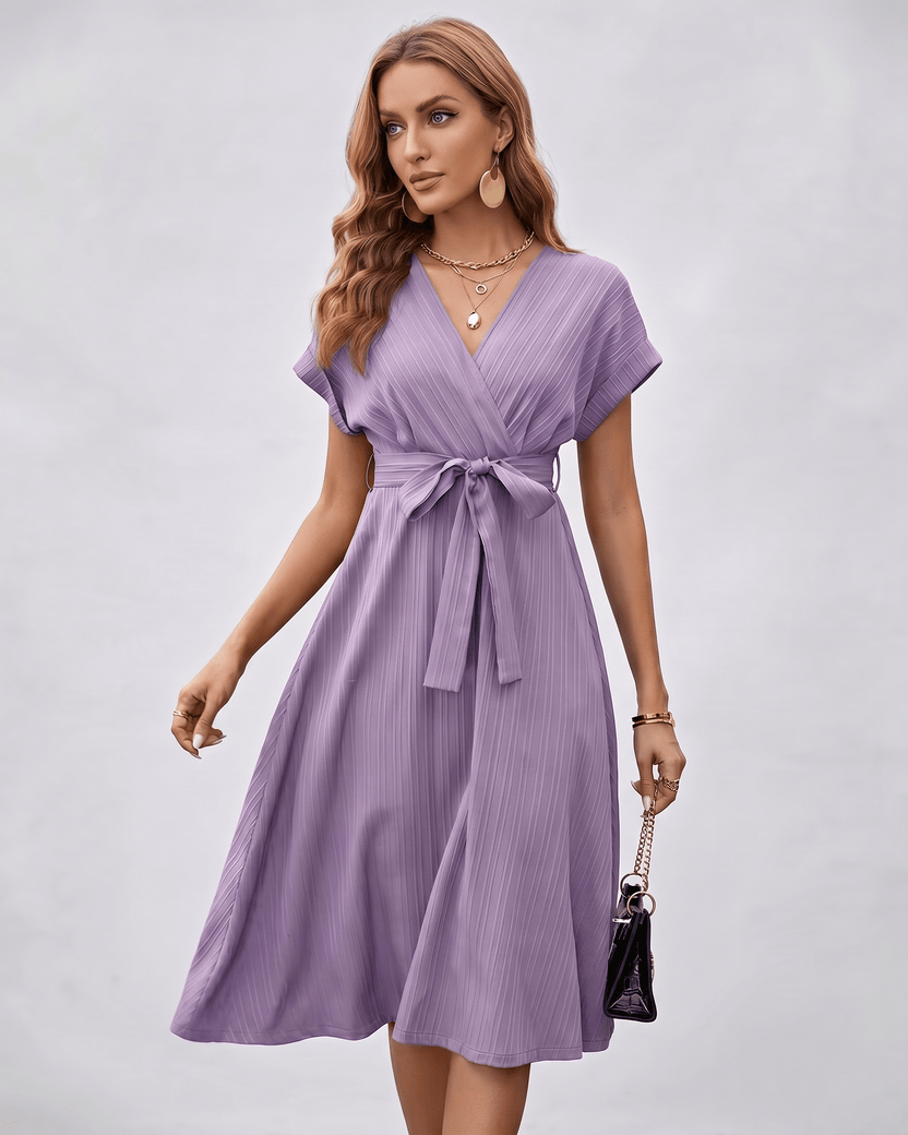 Serene Midi Dress in lavender, featuring pleated fabric, a V-neck, and self-tie belt from Lauven for elegant styling.