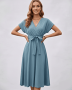 Serene Midi Dress in pleated blue fabric with V-neck and self-tie belt by Lauven, perfect for versatile styling.