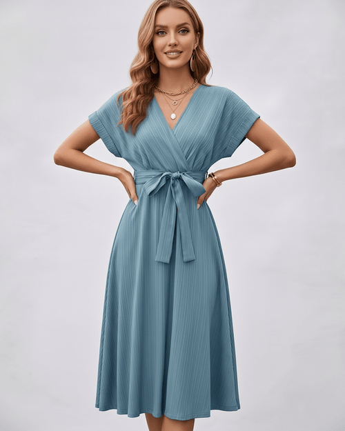Serene Midi Dress in pleated blue fabric with V-neck and self-tie belt by Lauven, perfect for versatile styling.