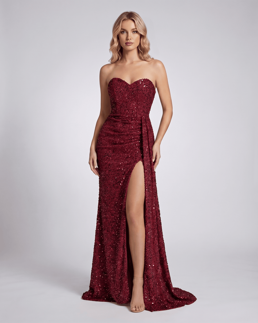 Serenza Maxi Dress in burgundy, strapless, fully embellished, bodycon silhouette, featuring a seductive thigh-high slit.