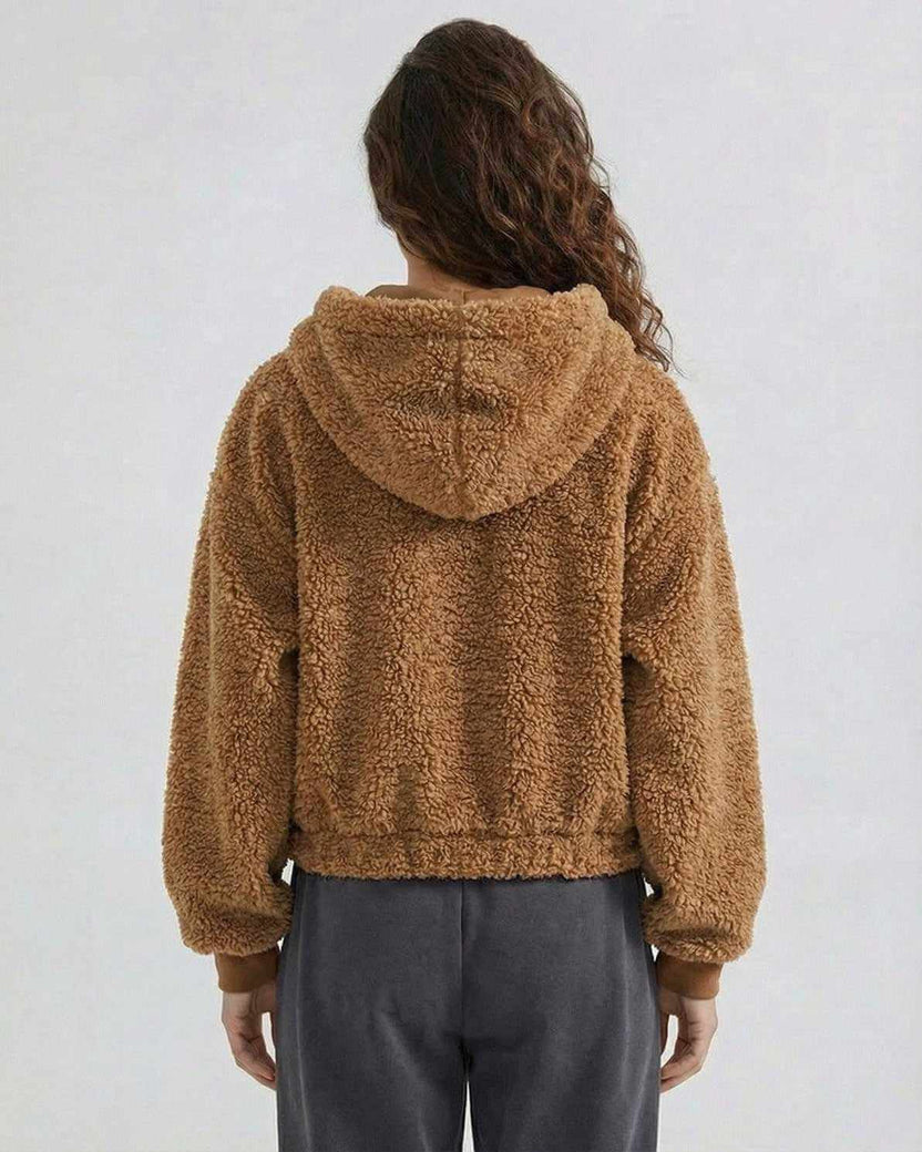 Back view of a woman wearing the Sienna Jacket, a brown, hooded fleece jacket from Lauven.