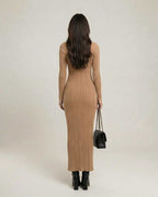 Sienna Maxi Dress - Beige ribbed knit design with turtleneck, showcasing a sleek minimalist silhouette from Lauven.