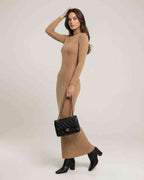 Sienna Maxi Dress in beige ribbed knit, turtleneck design, exuding refined elegance by Lauven.