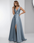 Sienna Maxi Dress showcasing a blue satin A-line silhouette, deep V-neckline, and elegant ribbon detail by Lauven.