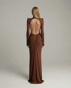 Sienna Maxi Dress features a high neck, long sleeve, ruched open back design in a striking brown color by Lauven.